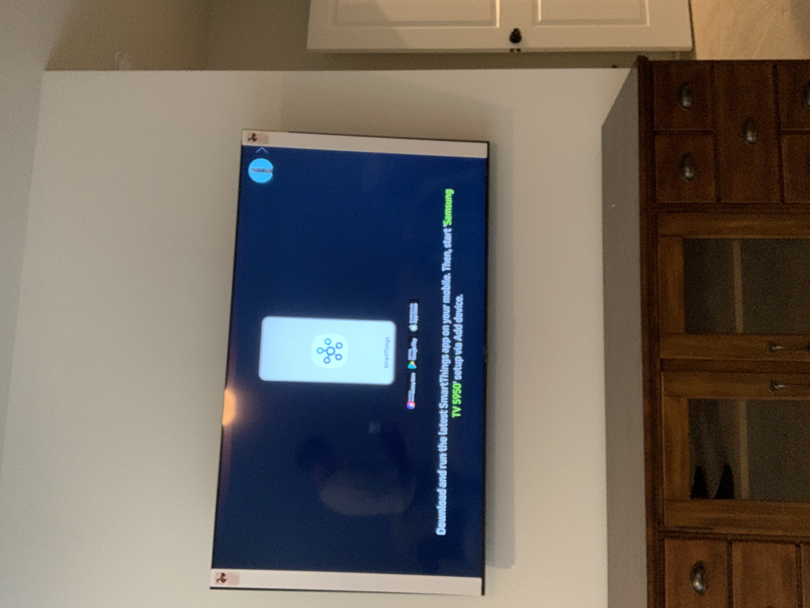 Full-motion bracket installation on drywall in Columbia, SC living room