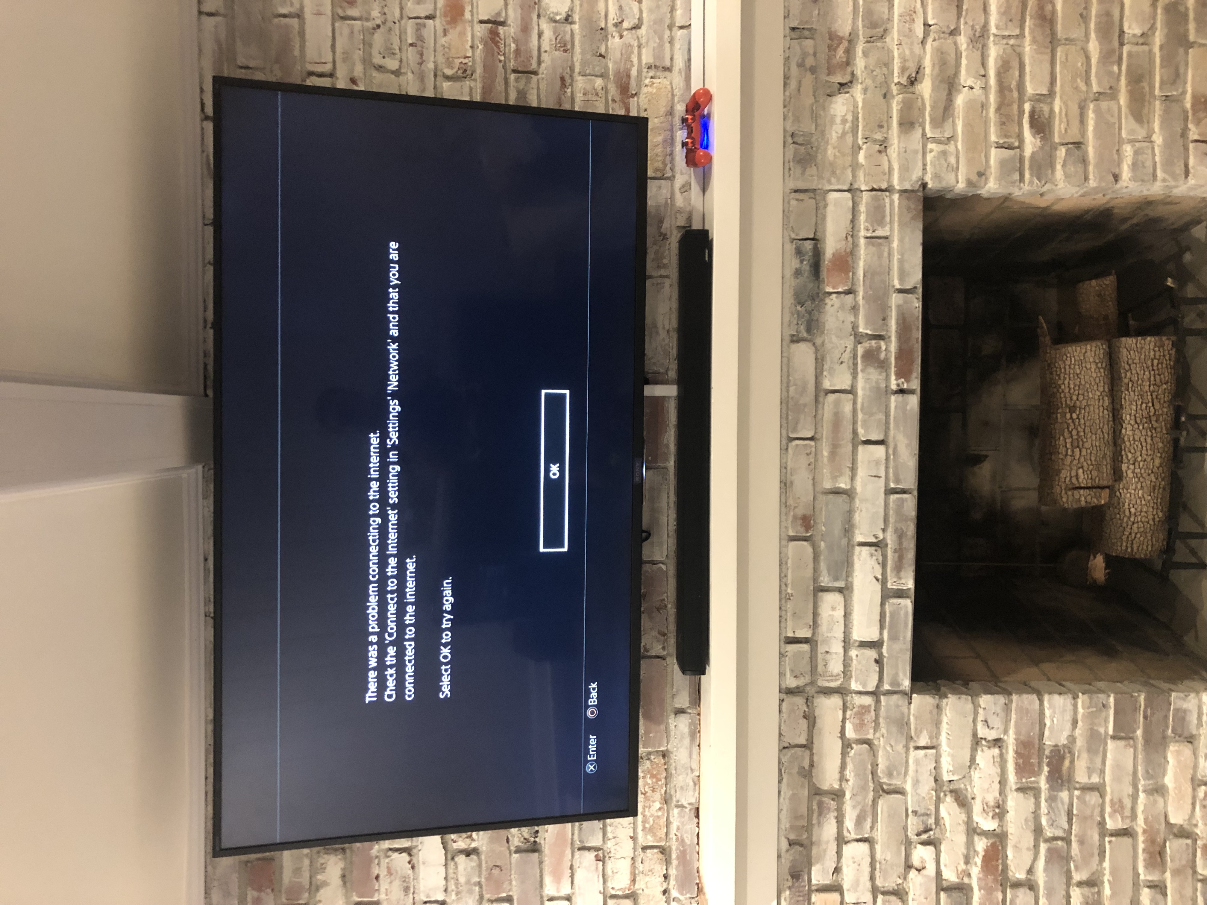 Full-motion TV mounting on drywall wall in living room, Charleston SC