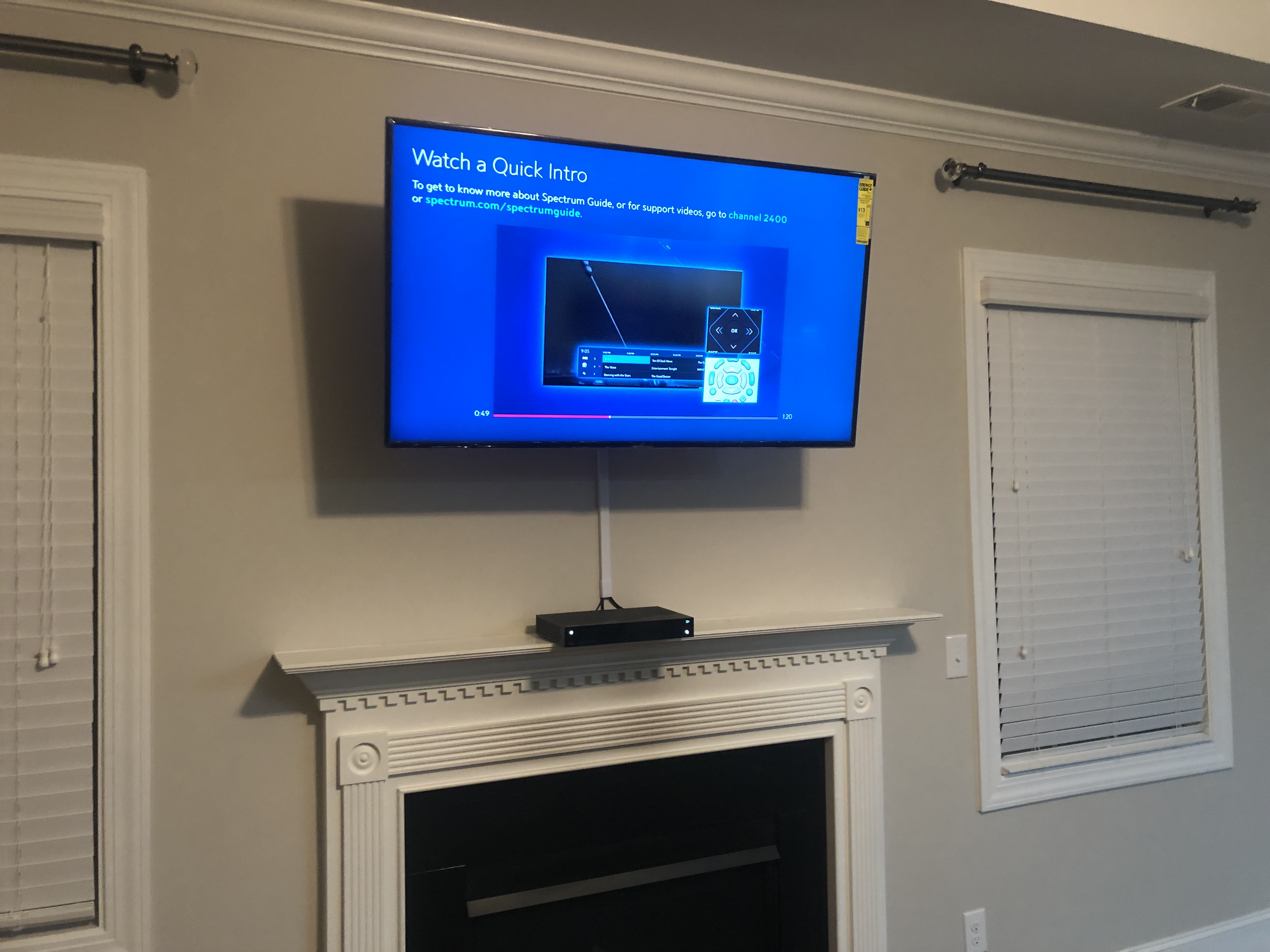 Fixed TV mounting on drywall wall in living room, service area
