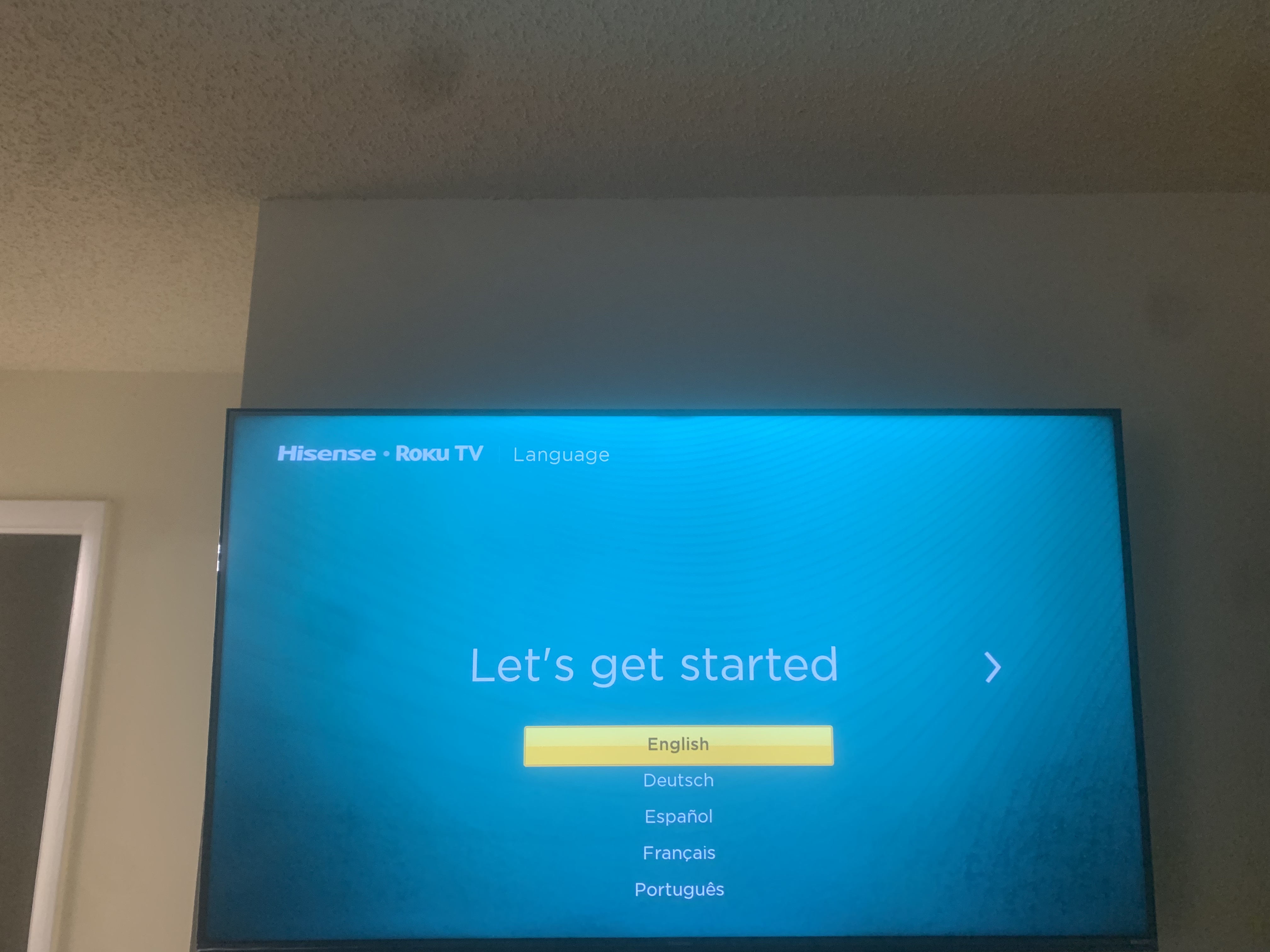 Fixed TV mounting on drywall wall in living room, service area