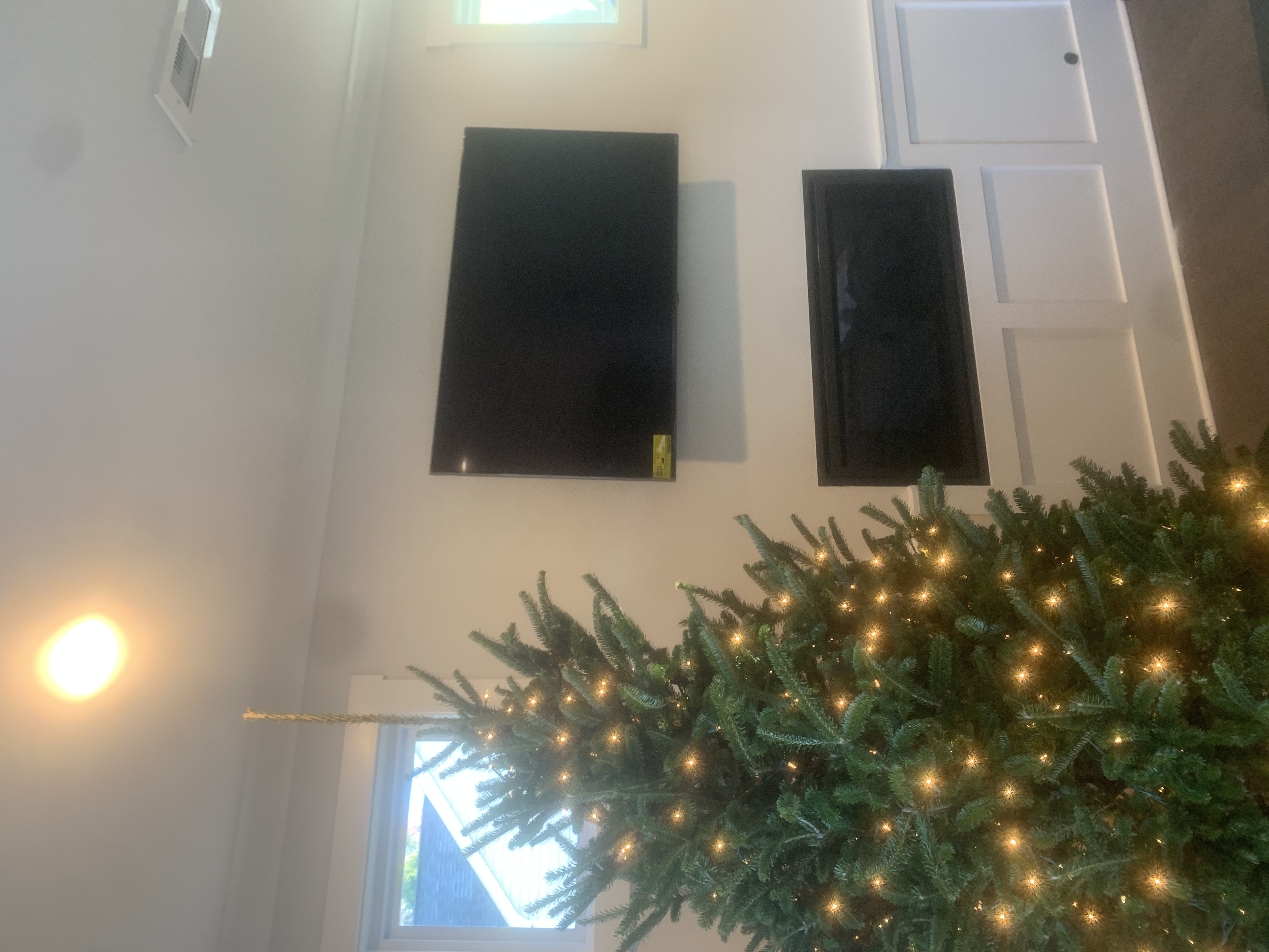 Tilting TV mounting on drywall wall in living room, Charlotte NC