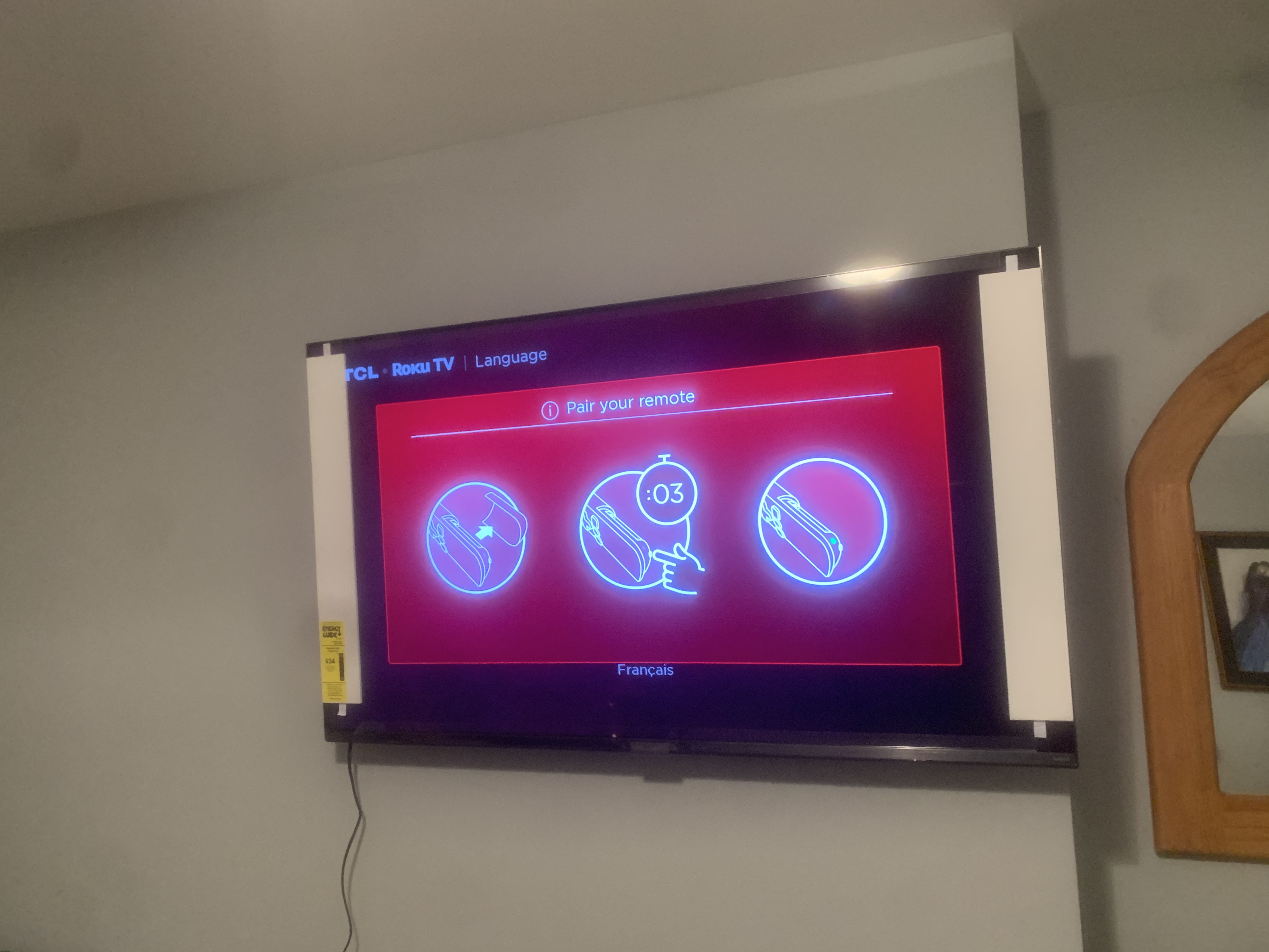 Tilting TV mounting on drywall wall in living room, service area