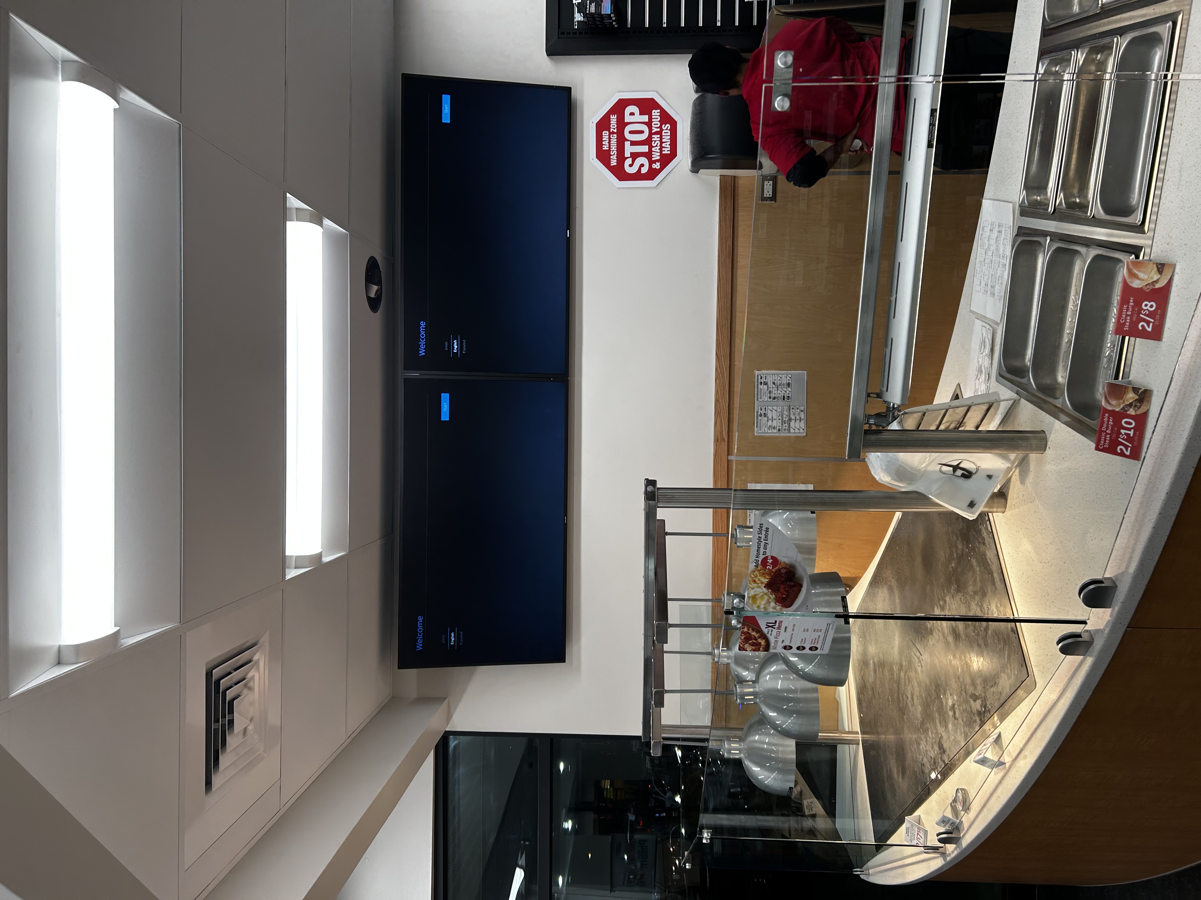 Full-motion TV mounting on drywall wall in living room, Charleston SC