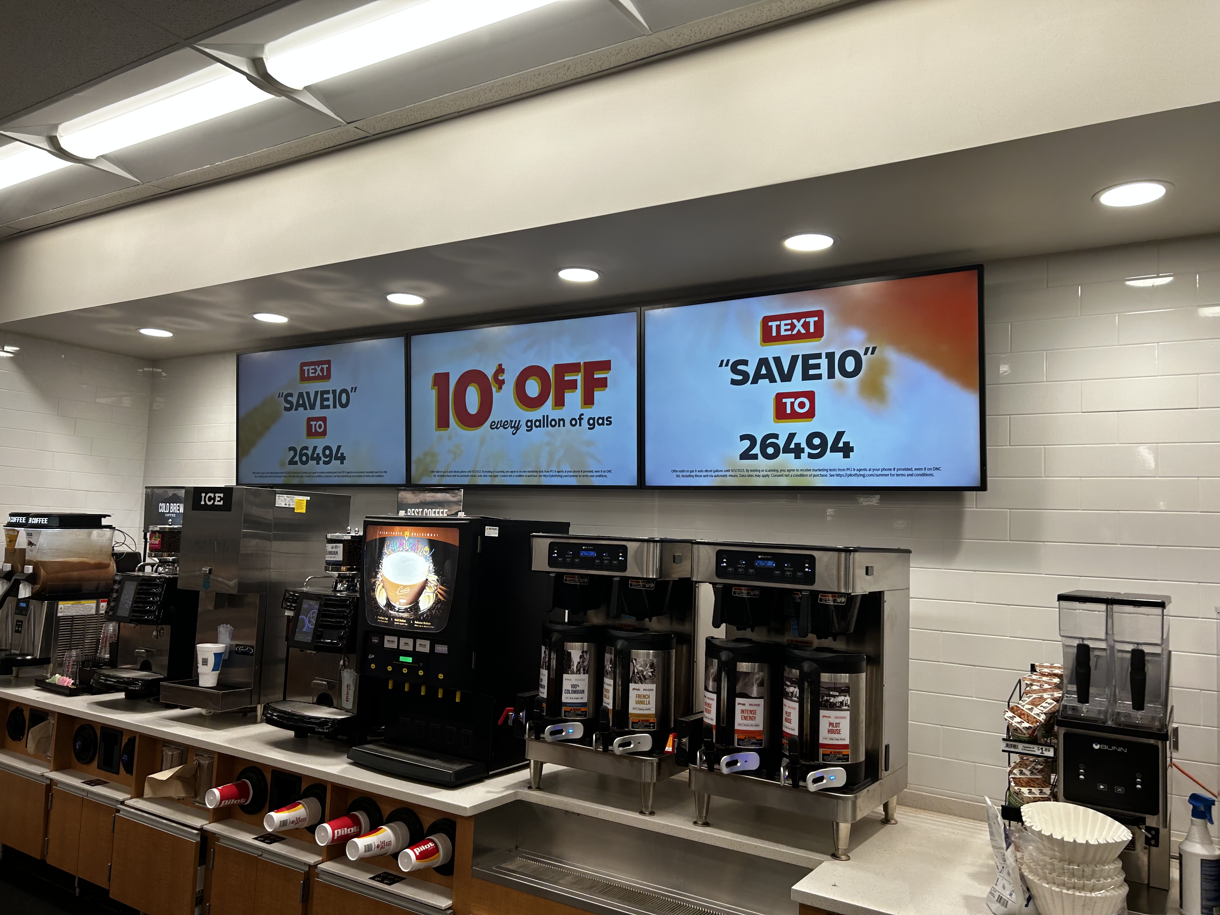 Full-motion TV mounting on drywall wall in living room, service area