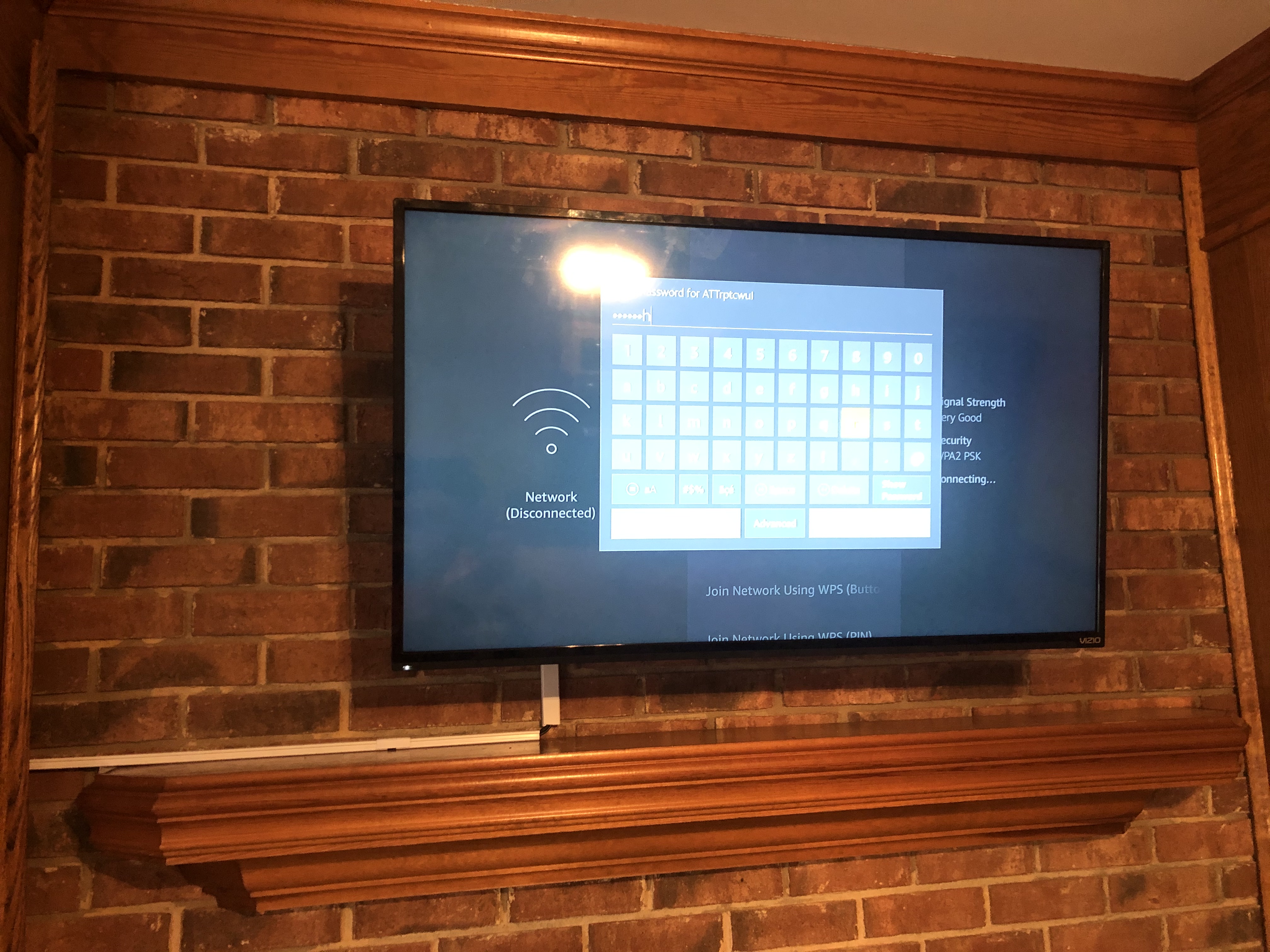 Full-motion TV mounting on drywall wall in living room, Charlotte NC