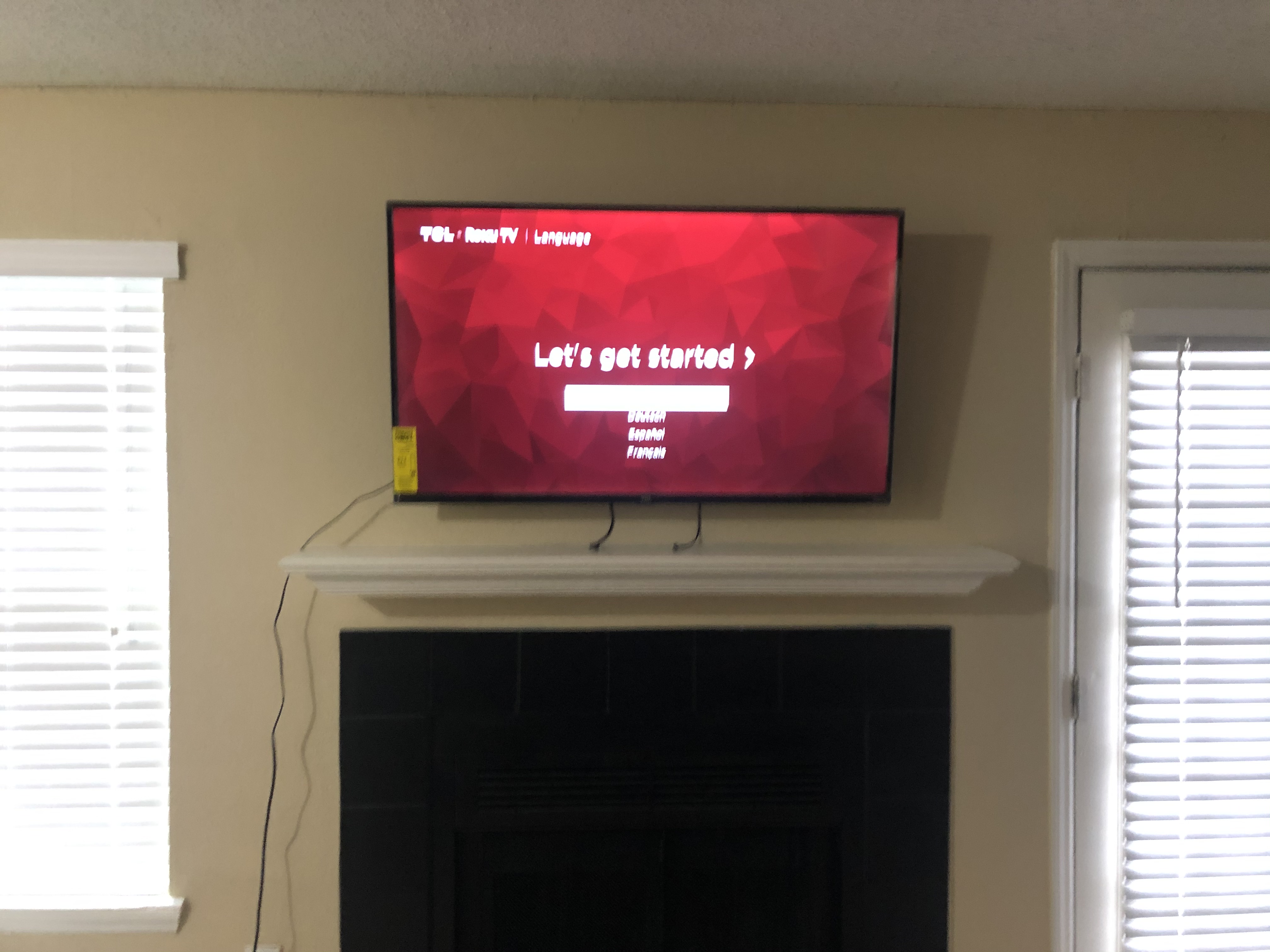 Full-motion TV mounting on drywall wall in living room, Columbia SC