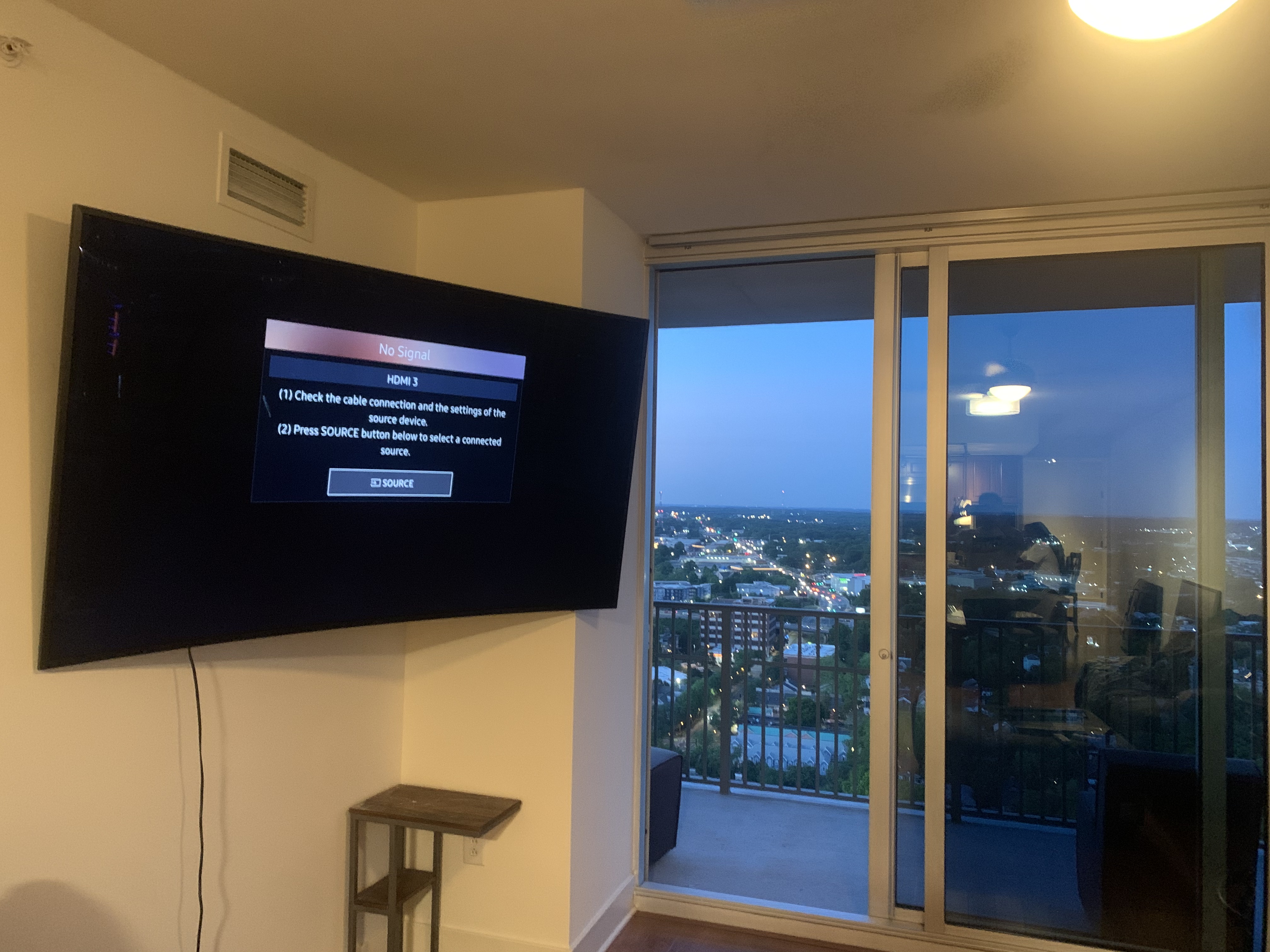 Full-motion TV mounting on drywall wall in living room, Columbia SC