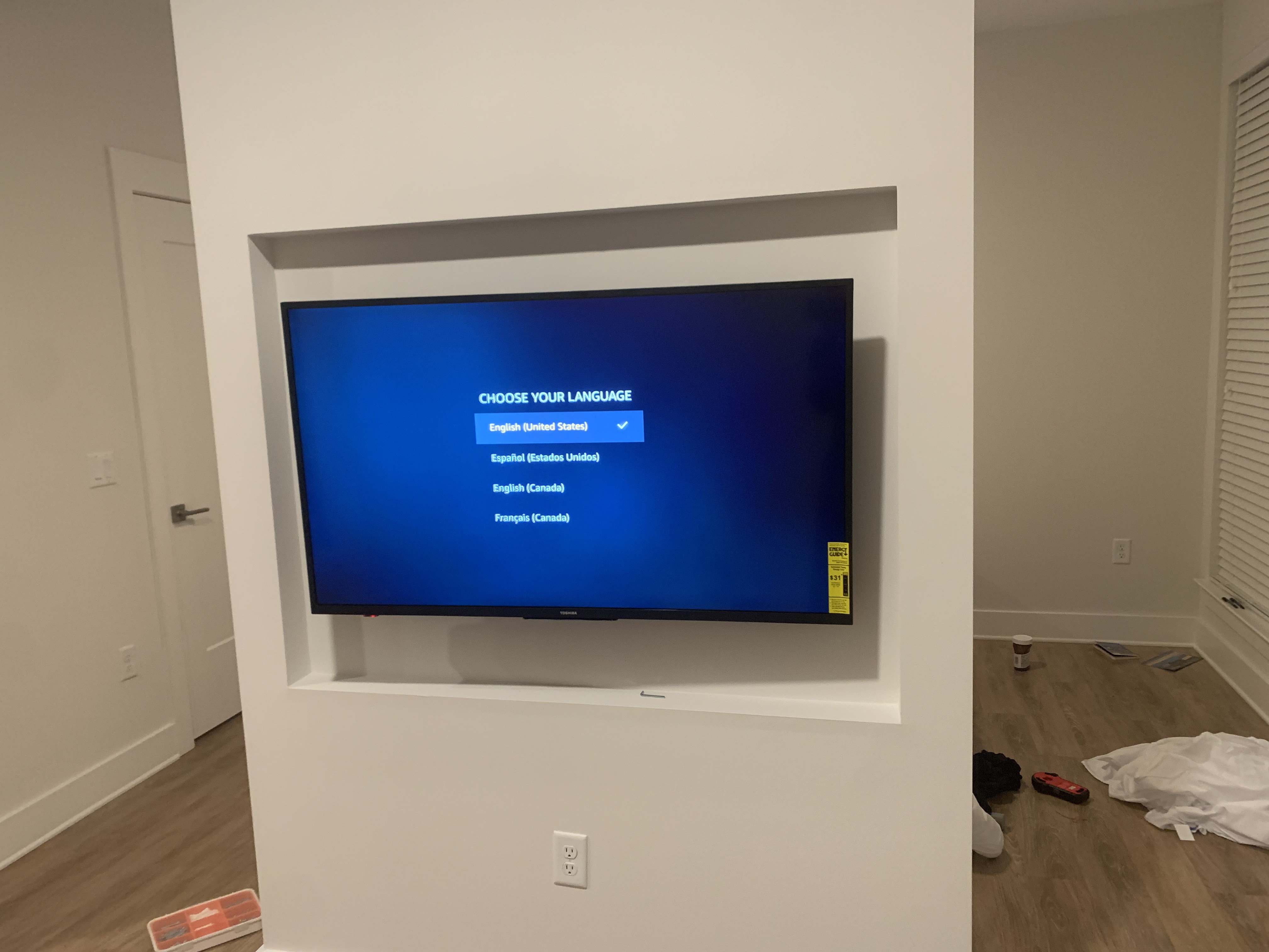 Full-motion TV mounting on drywall wall in living room, Charlotte NC
