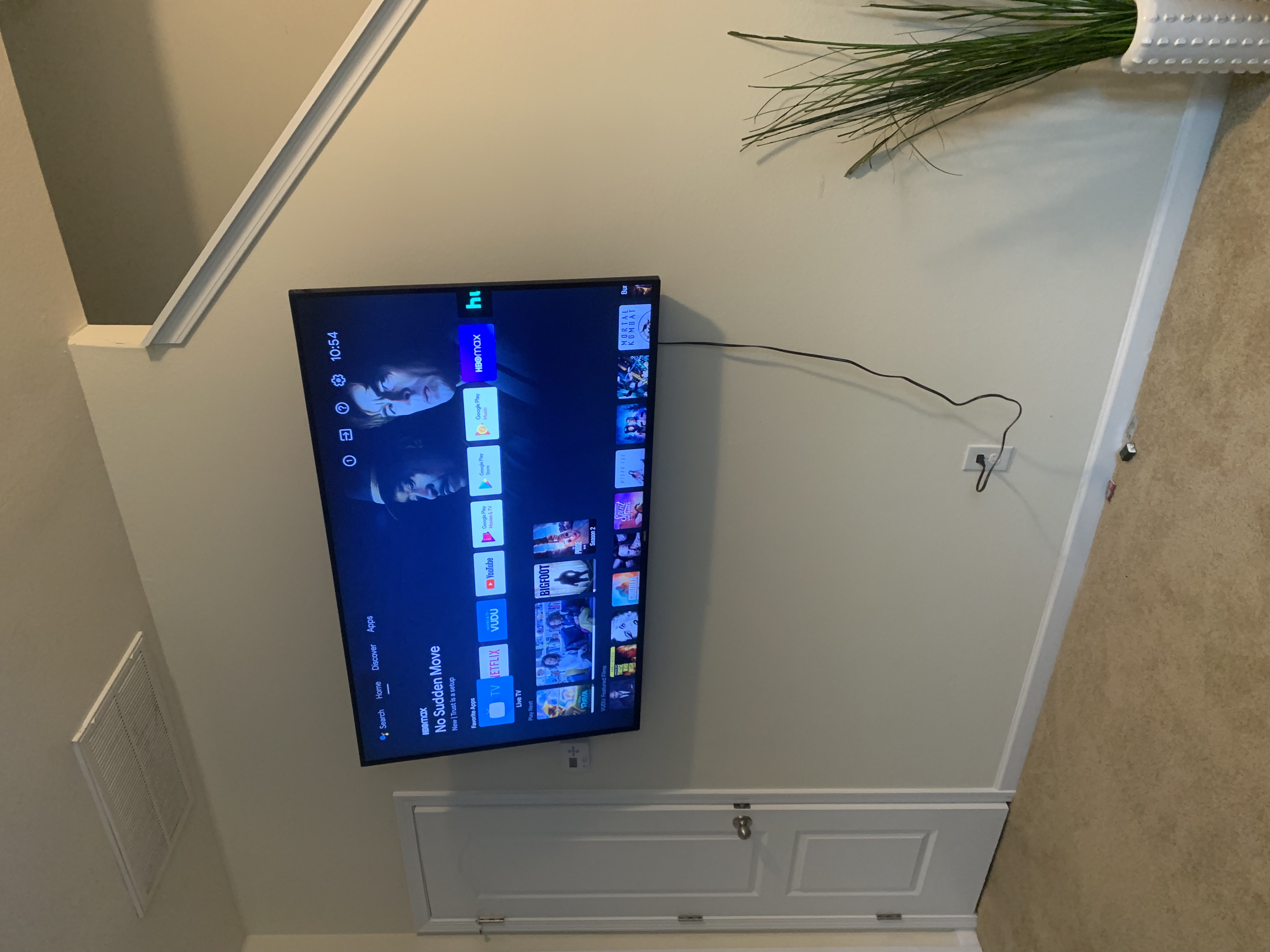 Fixed TV mounting on drywall wall in living room, service area