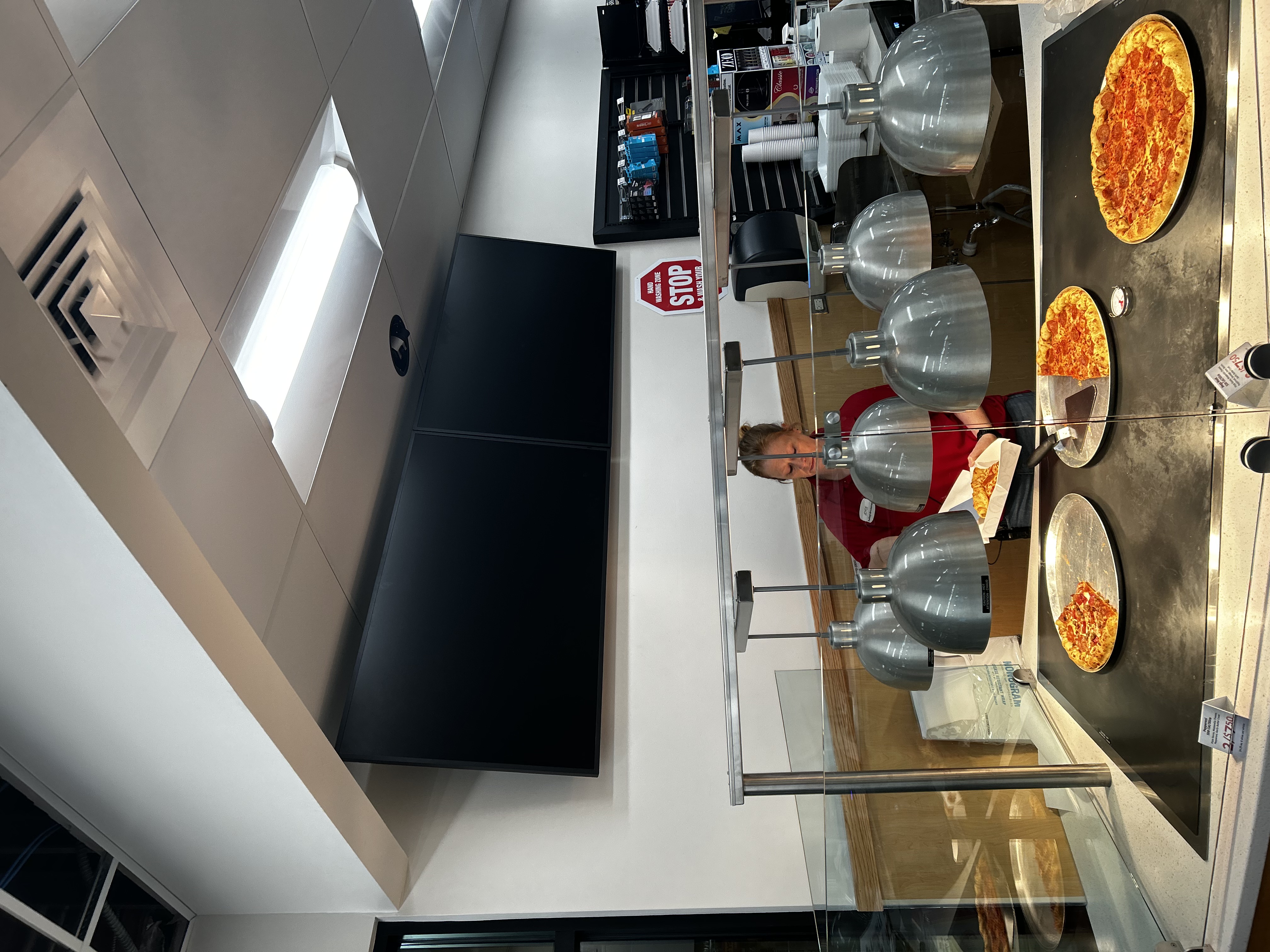 Fixed TV mounting on drywall wall in living room, service area