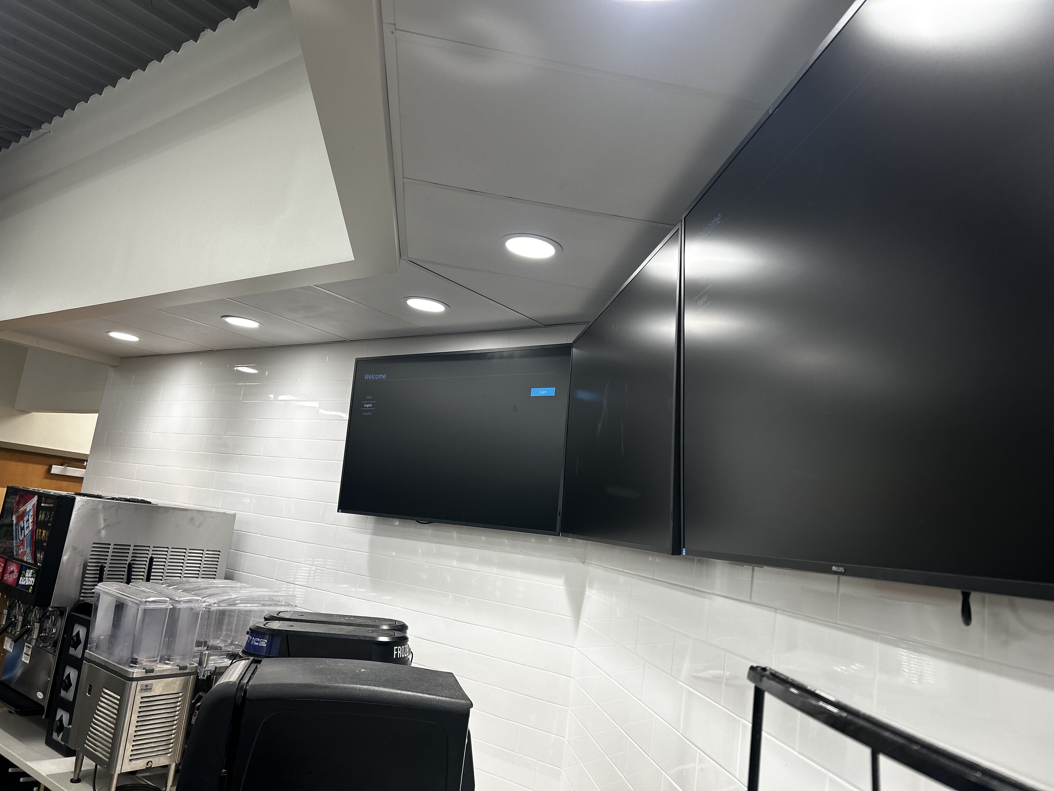 Full-motion TV mounting on drywall wall in living room, Columbia SC