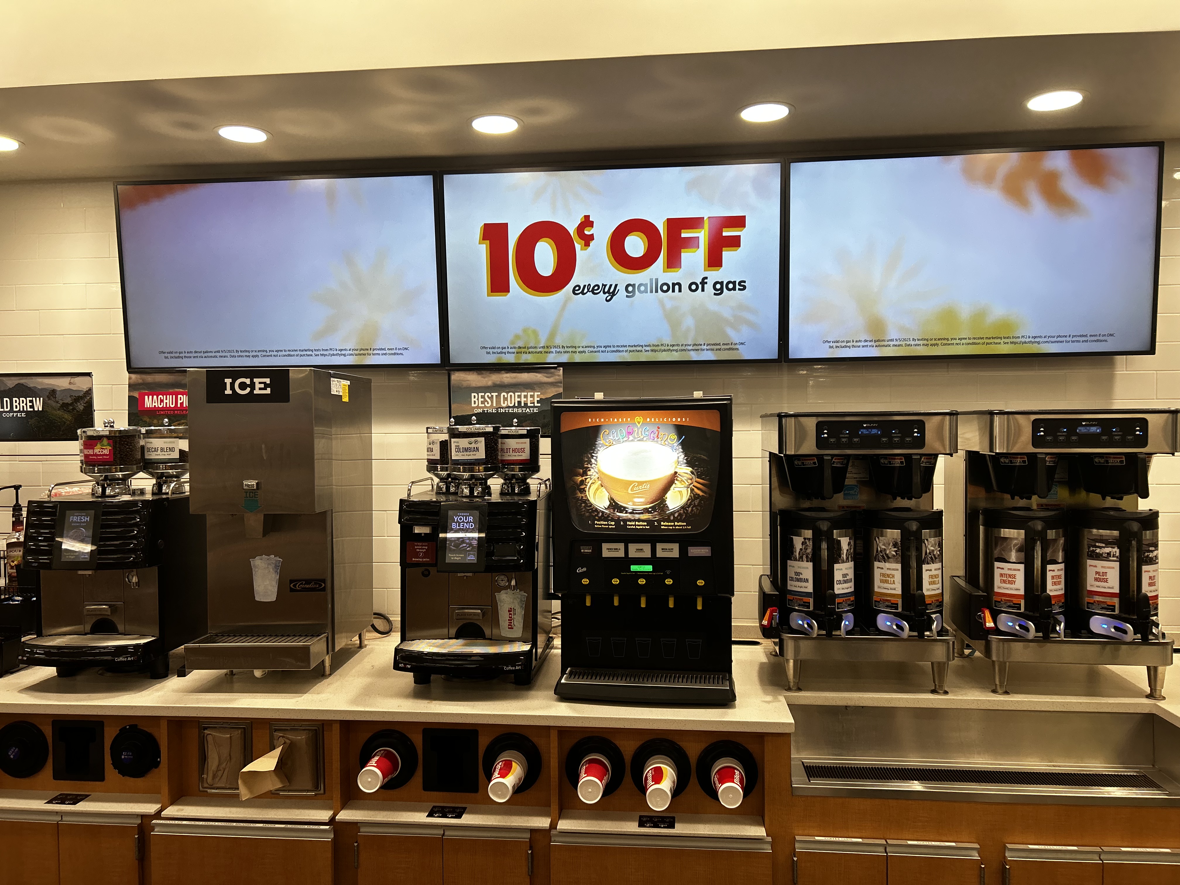 Full-motion TV mounting on drywall wall in living room, service area