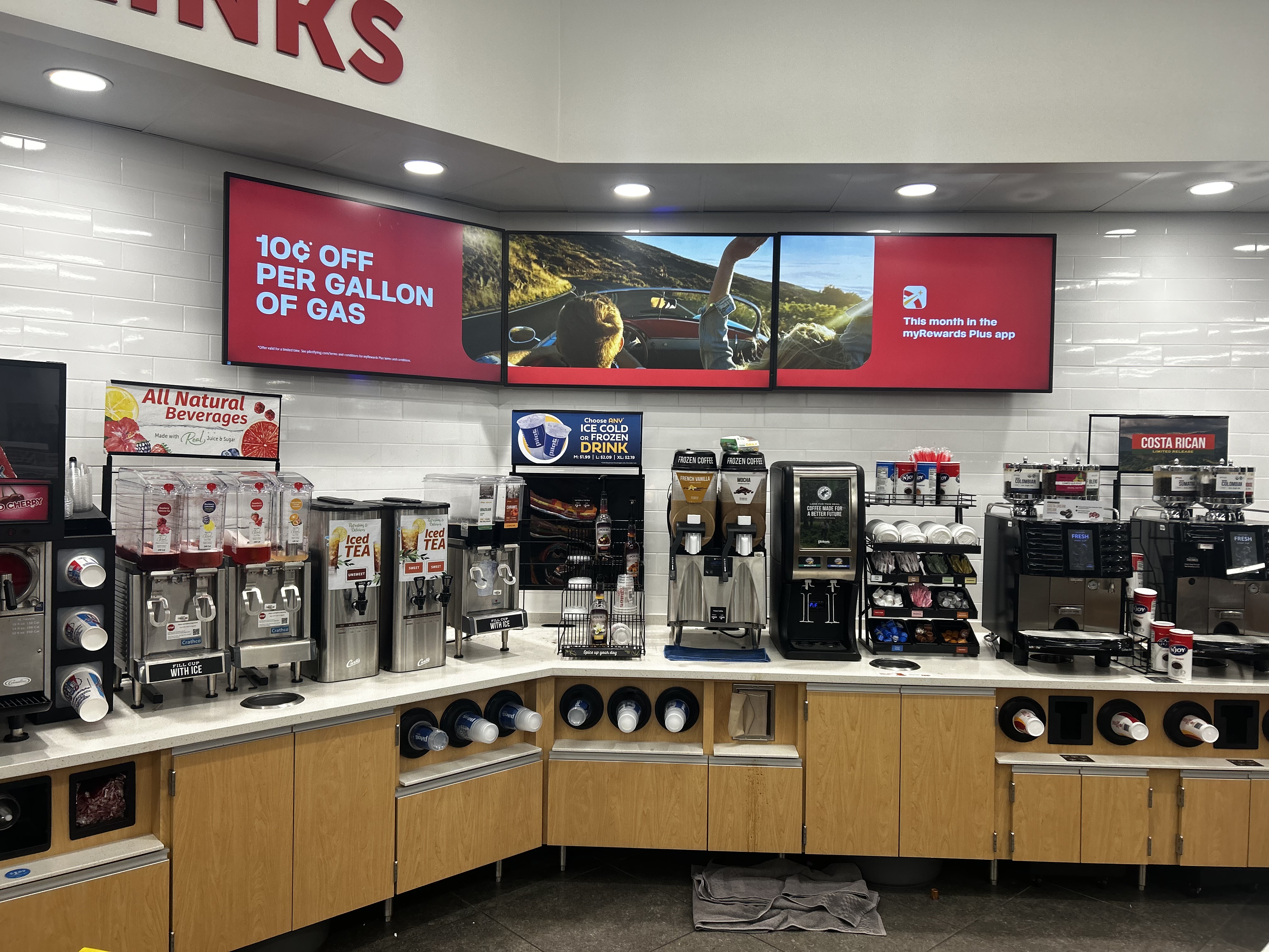 Full-motion TV mounting on drywall wall in living room, service area