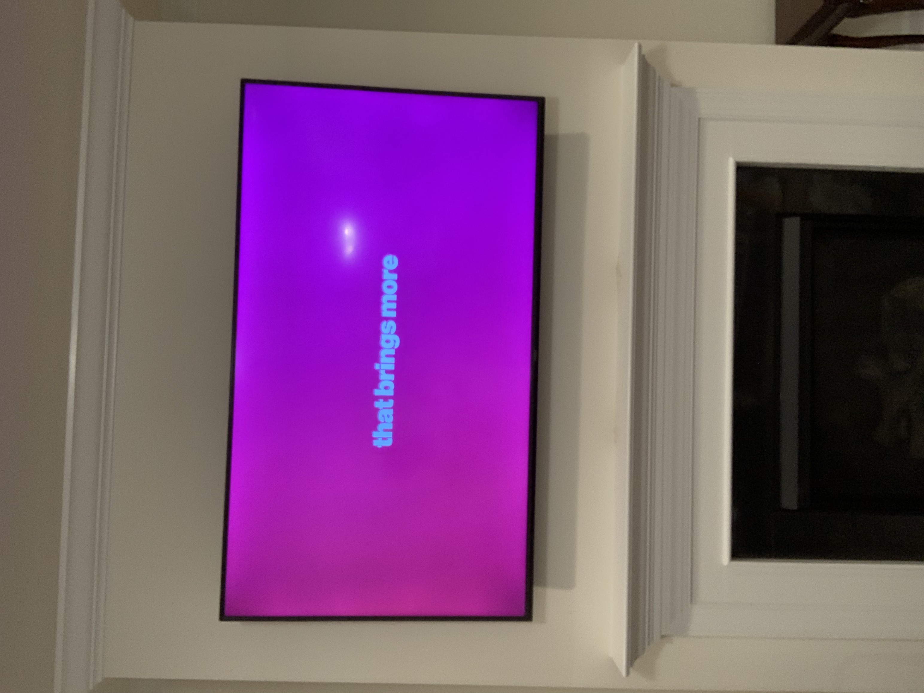 Full-motion TV mounting on drywall wall in living room, Charleston SC