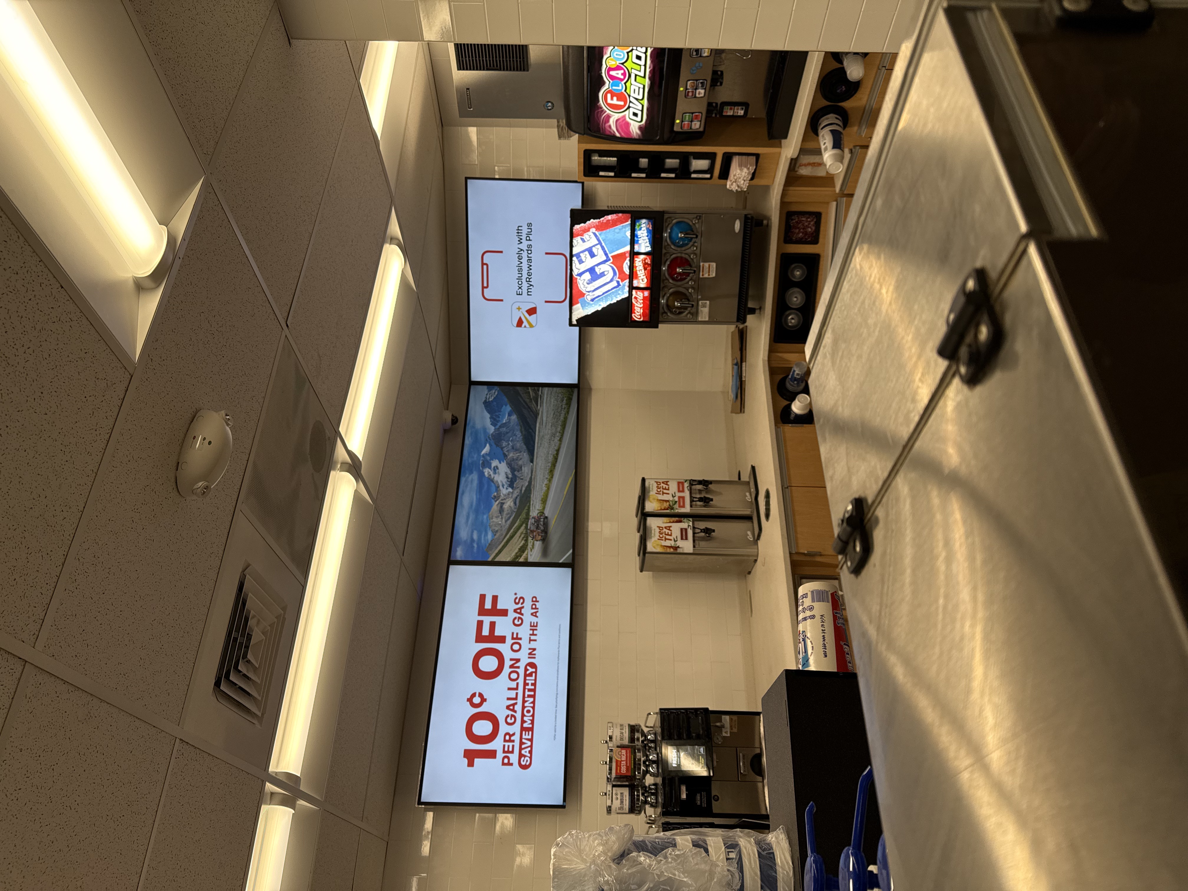 Tilting TV mounting on drywall wall in living room, service area