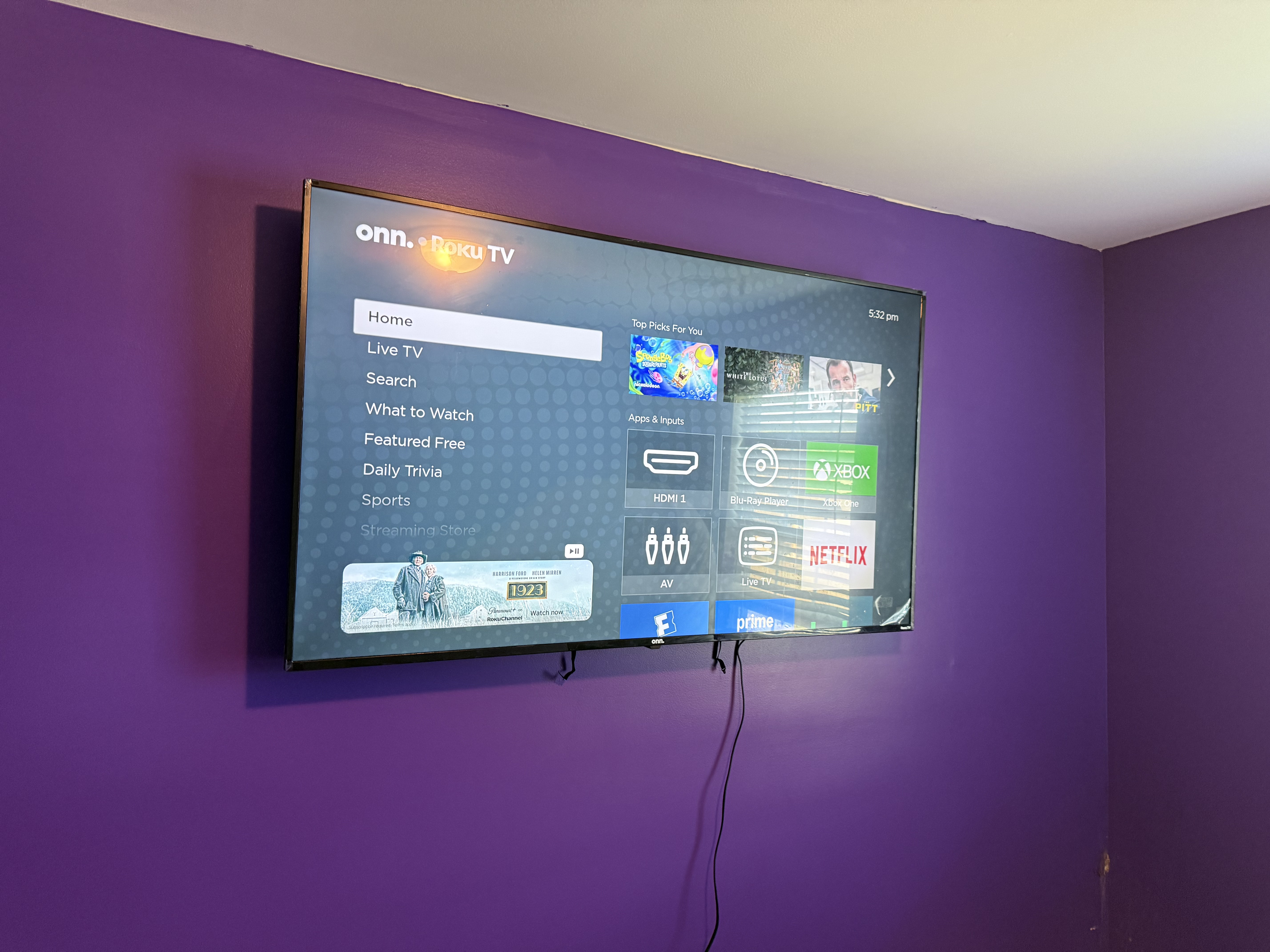 Fixed TV mounting on drywall wall in living room, service area