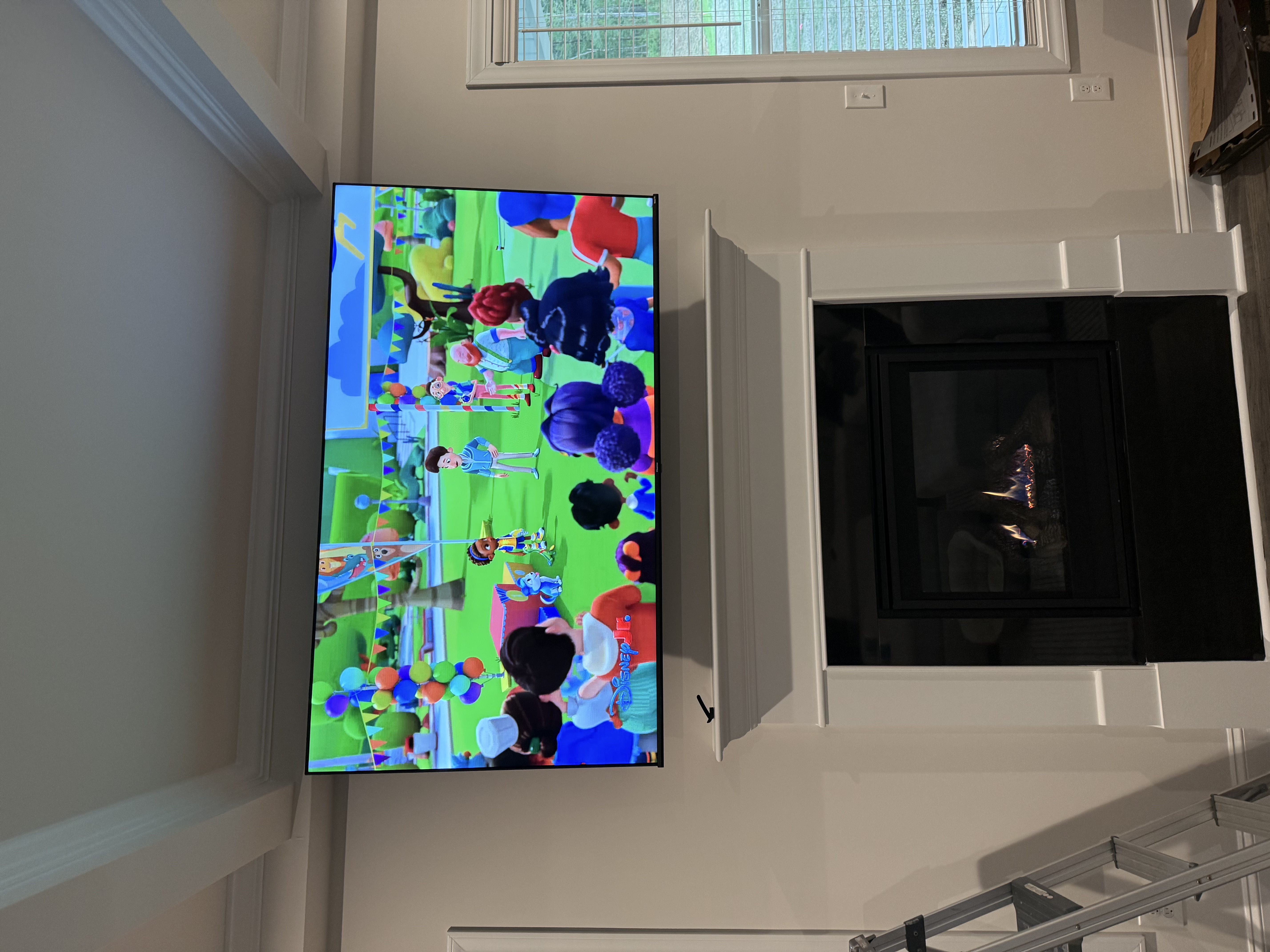Full-motion TV mounting on drywall wall in living room, Charleston SC
