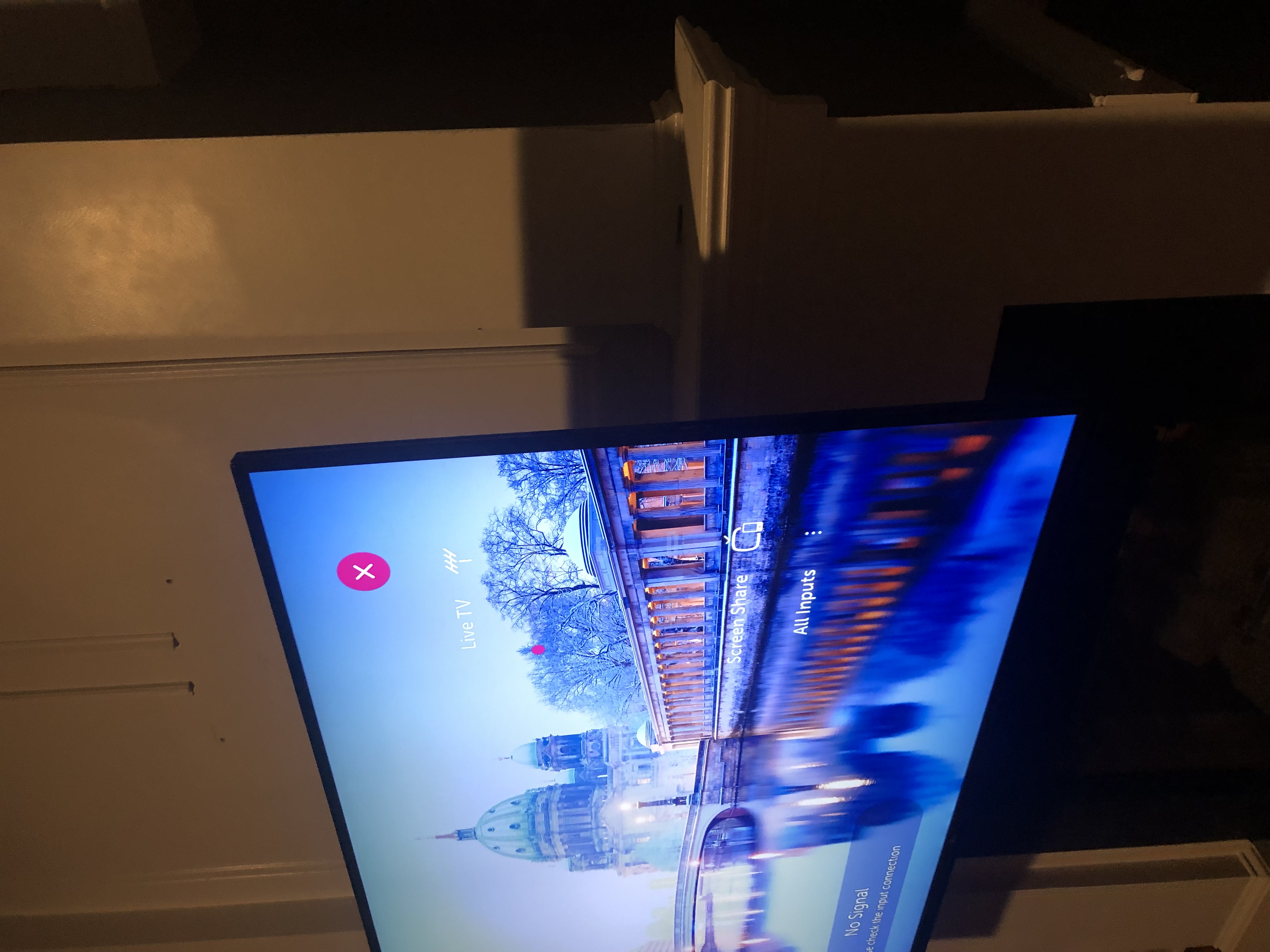 Tilting TV mounting on drywall wall in living room, service area