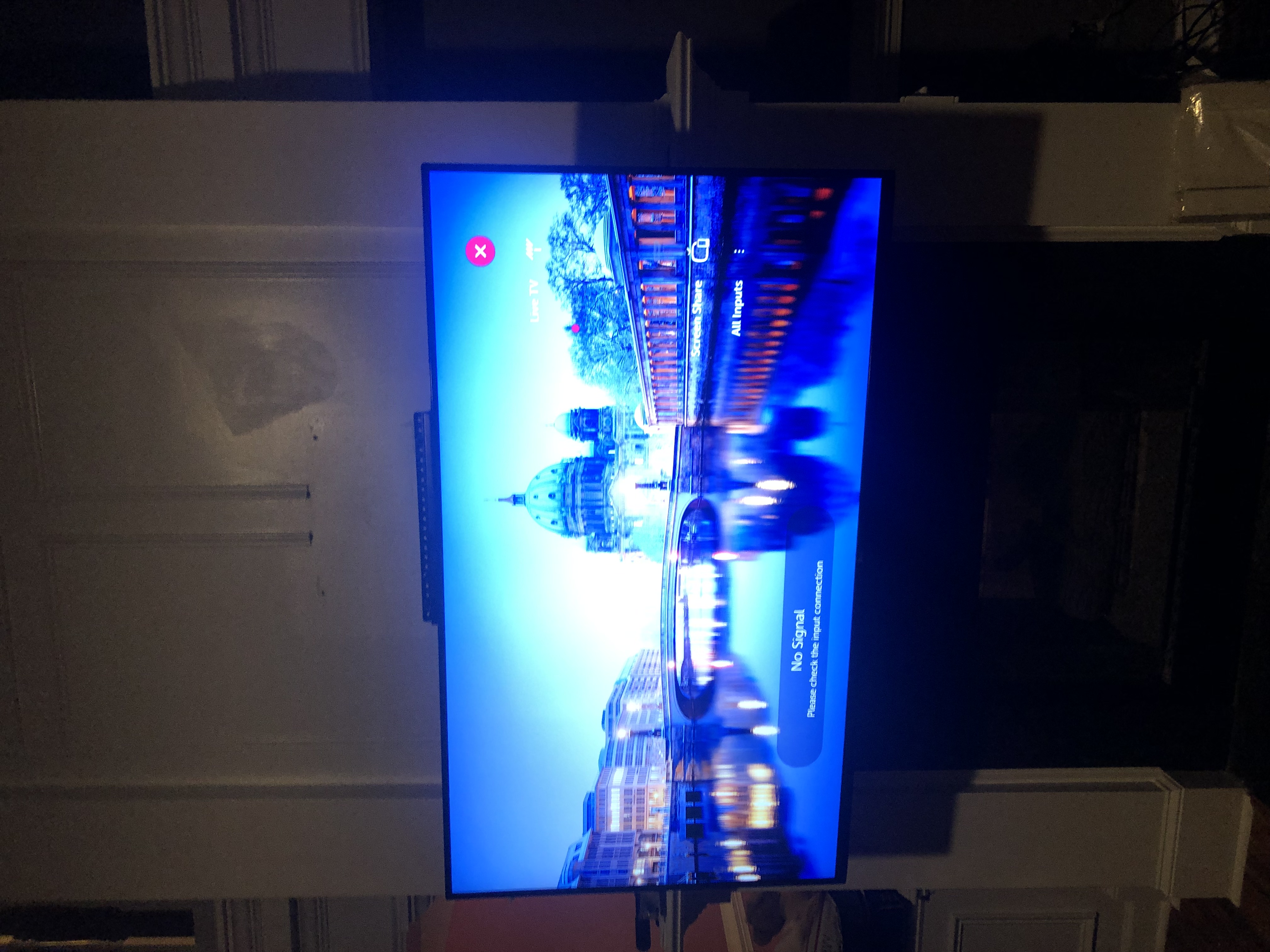 Fixed TV mounting on drywall wall in living room, service area